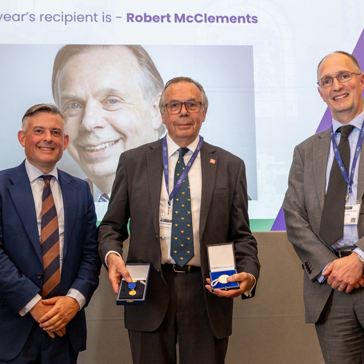 McClements (centre) receiving the Paper Gold Medal this week
